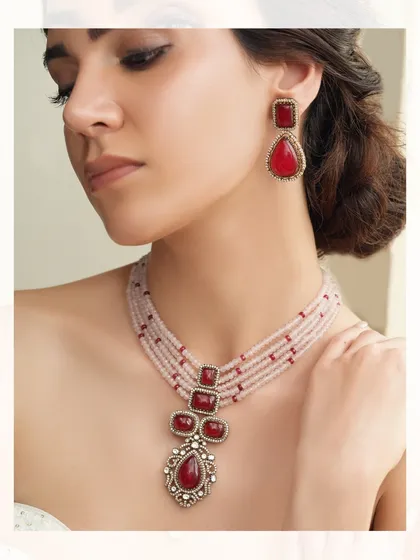 A vibrant red version of our beaded necklace set, perfect for making a bold and colorful statement at any festive event.