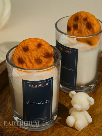 The Milk and Cookie candle is pure nostalgia. It features a hand-poured wax cookie sitting on top of a "glass of milk."