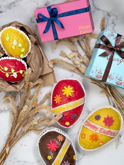 A colourful assortment of our handmade marzipan Easter eggs. Each one is uniquely decorated with floral designs, making them a beautiful and delicious treat.