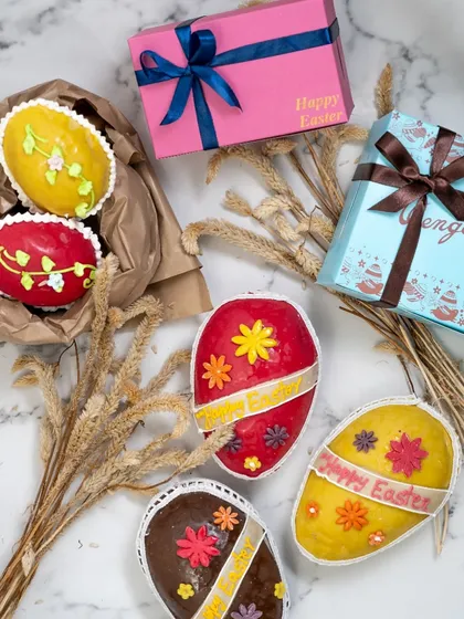 A vibrant collection of our colourful marzipan Easter eggs. Each one is hand-decorated with floral designs and festive messages, and they come in their own special gift boxes.