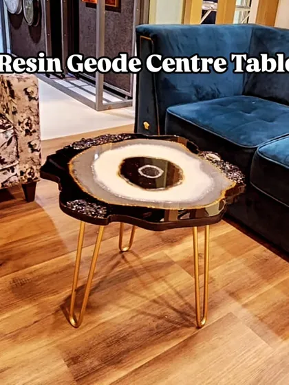 My art isn't just for walls. I also create functional pieces like this resin geode center table, designed to be a stunning focal point in your living room.