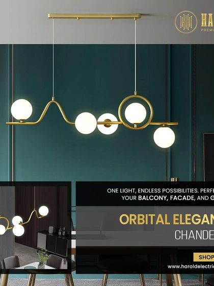 The Orbital Elegance Chandelier features a playful, wavy design with glowing orbs. It's a versatile piece that adds a touch of modern artistry over a dining table or in a living room.