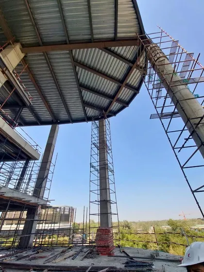 On-site construction progress of the Narmada project. This image shows the steel framework taking shape, giving a sense of the building's scale and structural complexity.