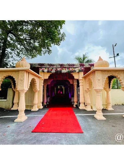 The entrance gate sets the tone for the entire event. For this Rajasthani themed wedding, I designed a grand entryway with carved pillars and a red carpet to give guests a royal welcome.