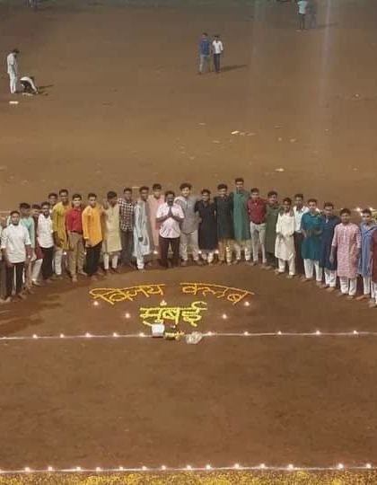 Our club members gathered in a semi-circle for the 2022 Laxmi Pujan.