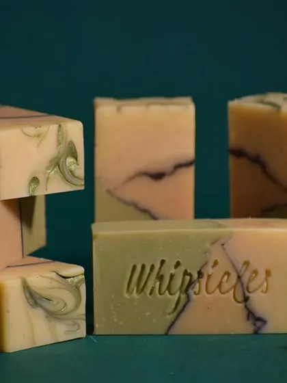 This is our Lemongrass Jasmine cold process soap. The beautiful swirls and fresh scent are a testament to our love for slow, intentional crafting with skin-loving, natural ingredients.