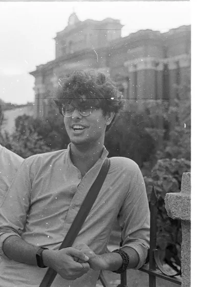 A joyful moment captured on film. Even with technical mishaps, the tangible result of a developed film roll is always a rewarding experience.