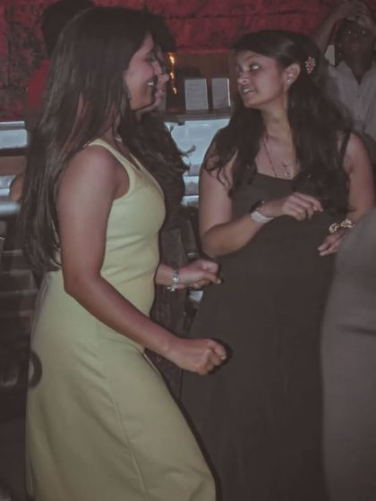 Two friends sharing a dance and a conversation. My pub is a place to connect and have fun.