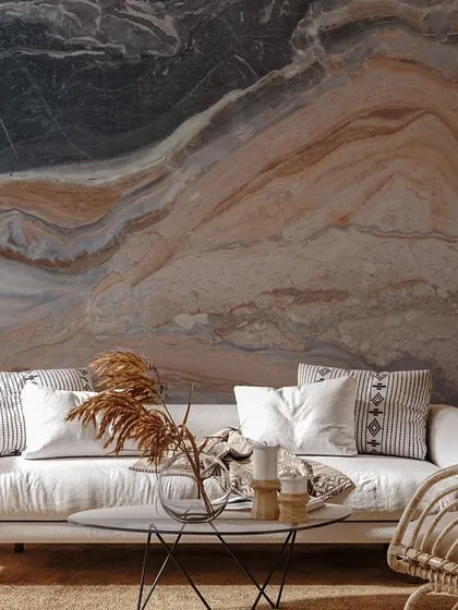 A beautiful wallpaper with a natural stone or marble texture in earthy brown and grey tones. This design adds a rustic yet sophisticated feel to the room.