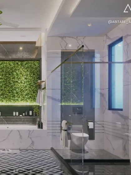 This bathroom was conceived as a private spa oasis. It features bold black and white geometric flooring, sleek marble walls, and a striking living green wall above the bathtub, creating a refreshing and luxurious escape.