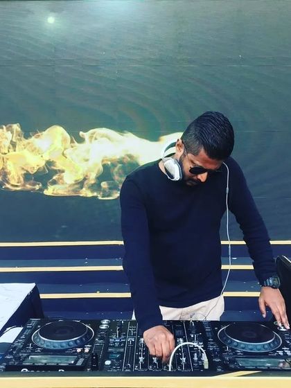 The music makes me happy. This photo captures the feeling I get when I'm playing a track that truly resonates with me and the crowd.