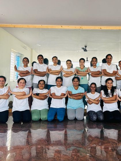 A wider view of our amazing students. Completing 108 Sun Salutations is a test of endurance and spirit, and they all passed with flying colors.