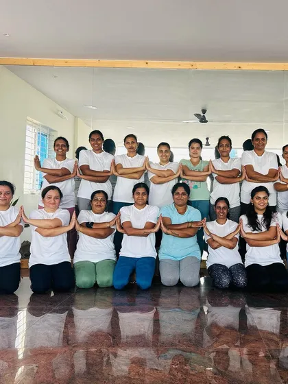 A wider view of our amazing students. Completing 108 Sun Salutations is a test of endurance and spirit, and they all passed with flying colors.