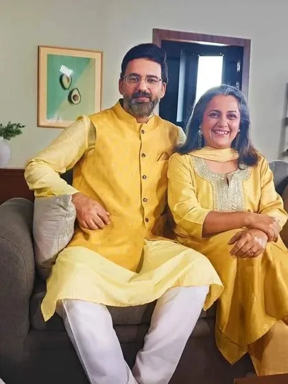 A lovely shot of the senior couple from the ad, looking elegant in our rental kurta and suit.