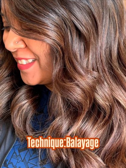 A closer look at the balayage technique used to create this terracotta blend. Hand-painting allows for a customized, natural-looking result that grows out beautifully.