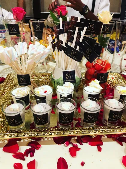 Our molecular and marshmallow shots are a feast for the eyes. We present them on beautiful trays with details like rose petals to elevate the experience.