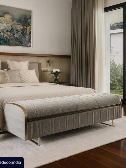 The master bedroom from our Villa Shakthi project, as featured in Elle Decor. The room opens onto a private garden, and the design uses a calm, neutral palette and rich textures to create a peaceful and luxurious retreat.