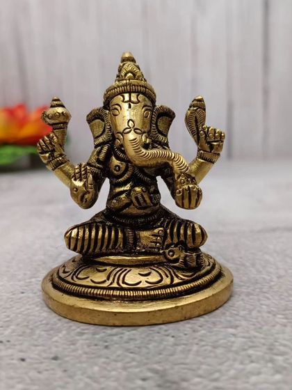 This brass idol of Lord Ganesha is perfect for removing obstacles and bringing good fortune. A must-have for any home or office.