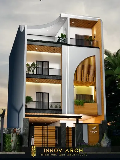 A second view of the upcoming residence in Noida Sector 26. This angle highlights the unique arched wooden element and the interplay between the solid white walls and the open balconies, creating a balanced and modern look.