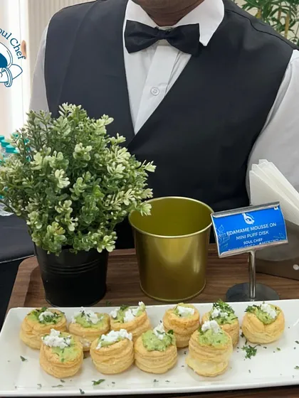 These Edamame Mousse on Mini Puff Disks are a perfect example of my fusion appetizers. The light, airy puff pastry is a perfect vessel for the creamy and savory edamame mousse, creating a sophisticated bite.