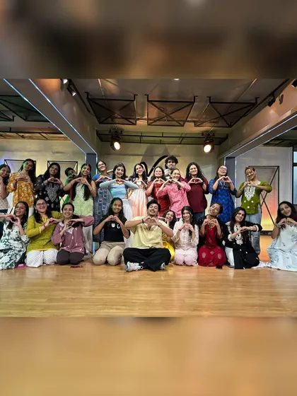 Spreading the love, one heart at a time. This photo captures the sweet, supportive vibe of our dance family after a soulful workshop.