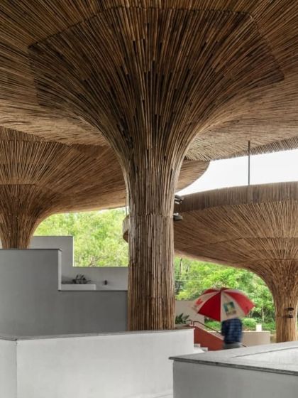 A playful moment at the TAPMI Centre, where the form of an umbrella echoes the shape of our bamboo-clad parasols. This highlights the connection between everyday objects and our architectural narrative.