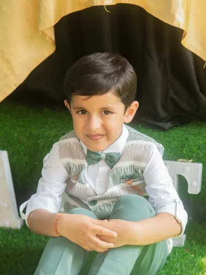 A candid birthday boy portrait. I specialize in capturing the special moments and details of your child's celebrations.