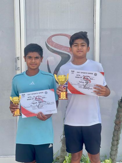 Yashas and his competitor showcase their trophies after the U-14 Talent Series. Yashas fought through the qualifying rounds to emerge as the champion, demonstrating incredible determination.