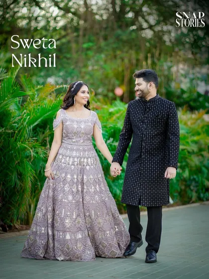 A beautiful pre-wedding portrait of a couple walking hand-in-hand through a park. We create relaxed and natural couple shoots that capture your connection.