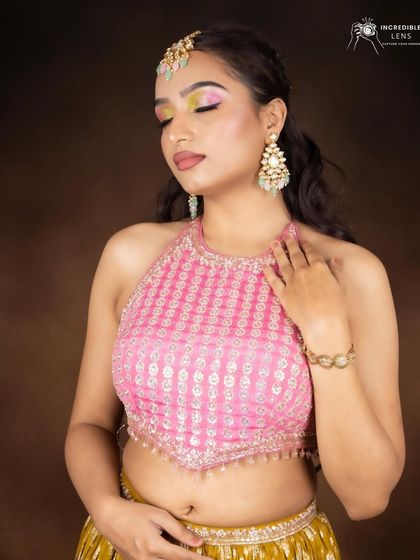 A close-up of the colorful eye makeup. Learning to blend multiple bright colors seamlessly is an advanced technique we cover in the pro course.