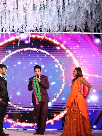 A wider view of the stage setup for a grand reception. I work with the decor and lighting to create a captivating experience for everyone present.