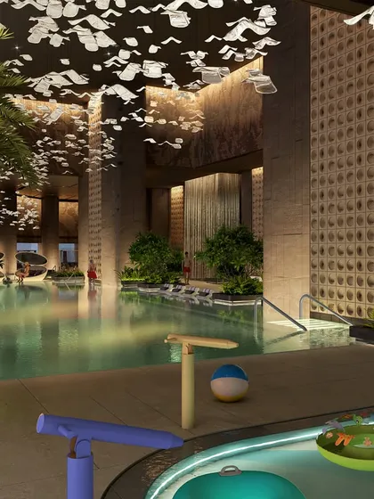 At Palais Royale, the poolside experience is designed with resort ease and metropolitan poise. A crystalline ribbon of water is framed by private cabanas and palm-lined greenery, creating a serene retreat where luxury is felt in the scale, proportion, and touch of every detail.
