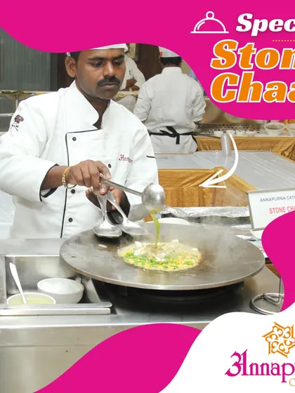 Our special Stone Chaat, where ingredients are mixed and cooked on a large, hot stone tawa. This unique preparation method adds a distinct flavour and a fun visual element.