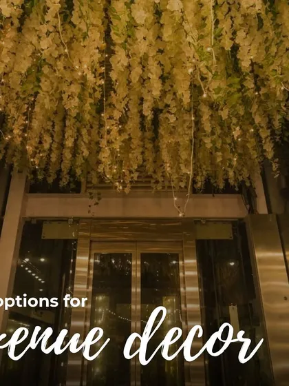 We offer multiple options for venue decor, including this stunning floral ceiling installation over the entrance elevator.
