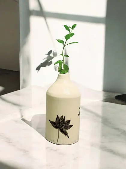 My new hand-painted vase, captured in the beautiful morning light. Inspired by nature, this stunning handmade piece looks amazing anywhere, with or without flowers.