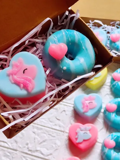 A close-up of the unicorn and donut soap gift box, a perfect small gift or party favor.