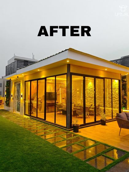 A stunning "after" shot of the glass house at night. The warm interior lighting makes it look like a lantern in the garden, creating a beautiful and inviting focal point.