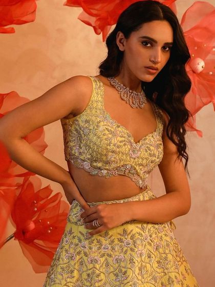 This selection showcases the breadth of my bridal and couture curation. It includes a variety of lehengas, gowns, and sets in different colors and styles, from traditional reds by Anupraas to modern ivories by Mirroir and Varun Chakkilam, ensuring every bride finds her perfect look.