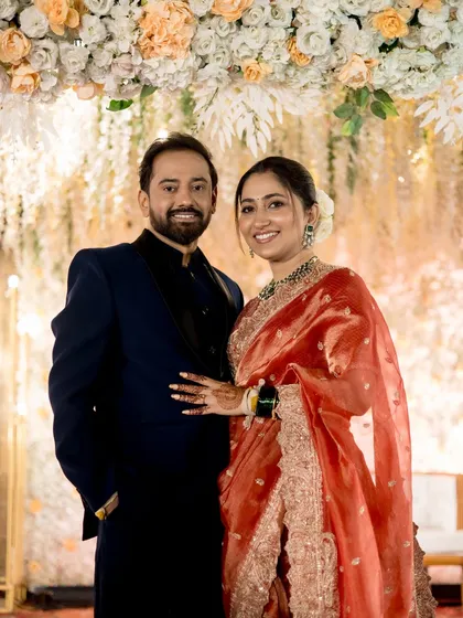 A classic portrait of the couple, looking elegant and happy.