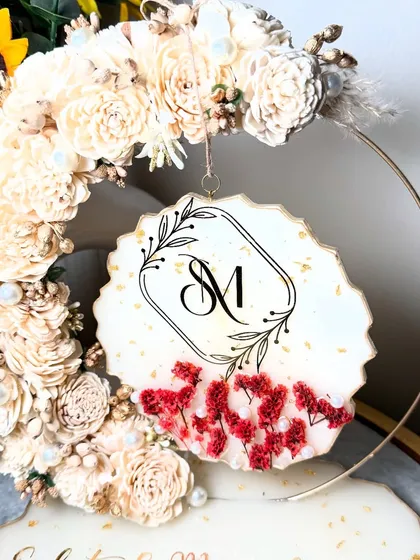 Another view of the beautiful floral hoop, perfect for adding a decorative touch to your engagement ceremony.