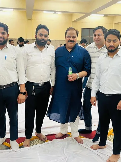 Posing with colleagues at the Iftaar gathering. It's a wonderful opportunity to share a meal and strengthen our bonds.