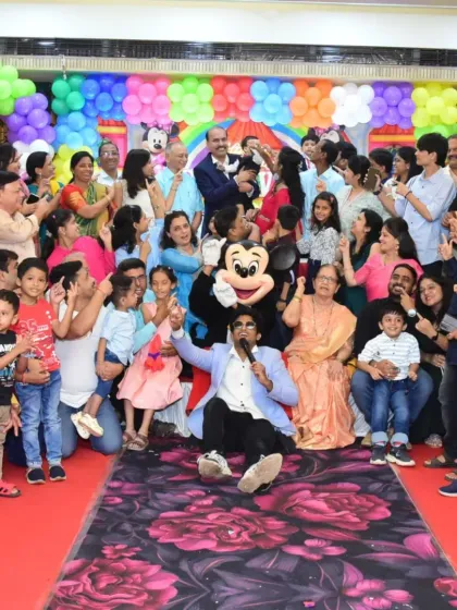 This is what a successful event looks like to me: a room full of happy faces. As a host, my main job is to bring everyone together for a memorable group experience, and this photo from a birthday party captures that energy perfectly.
