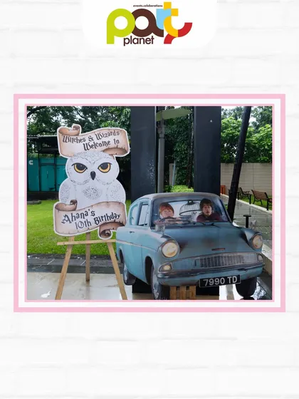 A life-sized prop of the flying Ford Anglia car from Harry Potter, creating an amazing photo opportunity for young witches and wizards.
