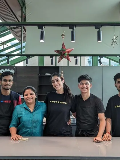 Here I am with the fantastic team at The Conservatory after our successful 'Christmas with Tresa' pop-up. I thrive on collaboration and can train your kitchen staff to execute a new menu seamlessly, ensuring every detail is perfect.