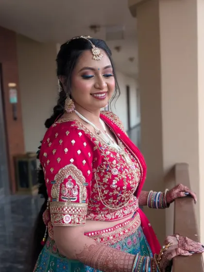 A radiant Gujarati bride ready for her Phera ceremony. Her look features a vibrant lehenga, traditional jewelry, and luminous makeup designed to last through all the rituals and celebrations.