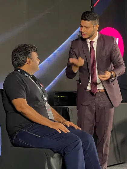 A moment of intense focus during my corporate mentalism show for Itel. This is where I connect with a volunteer on stage, preparing to reveal a thought they believe is completely private.