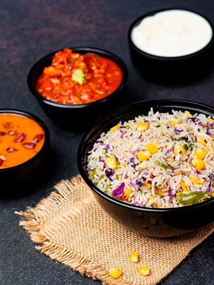 Our Burrito Bowl is proof that healthy can be exciting. It comes with flavorful rice, a zesty salsa, rich bean sauce, and cool cream cheese for a complete and satisfying meal.