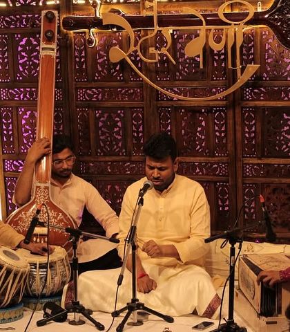 A full ensemble performing at our monthly baithak. We feature a variety of artists, including vocalists and instrumentalists, to offer a diverse musical experience.