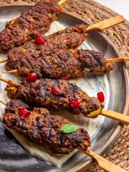 The right plate makes all the difference. Here, my rustic, dark-glazed platter provides the perfect canvas for presenting these delicious kebabs, enhancing the visual appeal of the food.