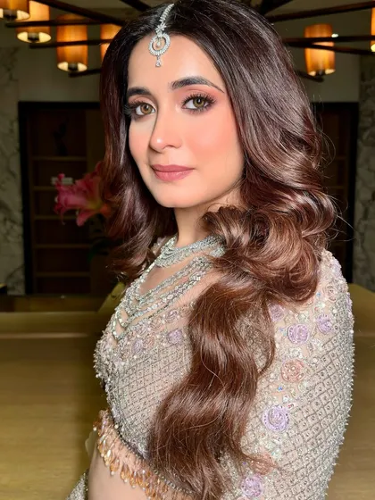 A closer look at this exotic and elegant reception makeup. The soft smokey eye and glowing skin are perfect for an evening of celebration.